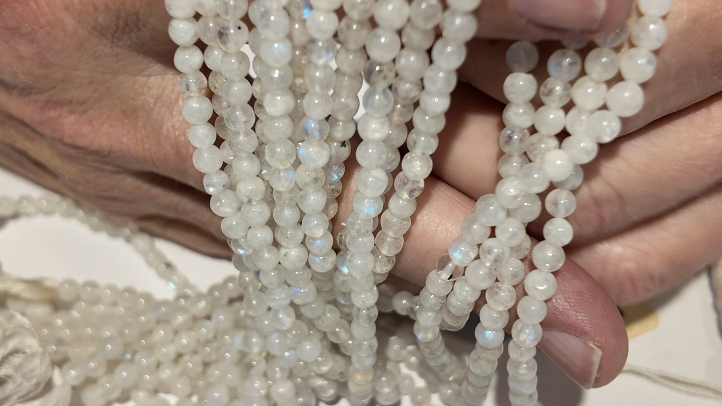 Moonstone round beads approx 4mm 15" strands
