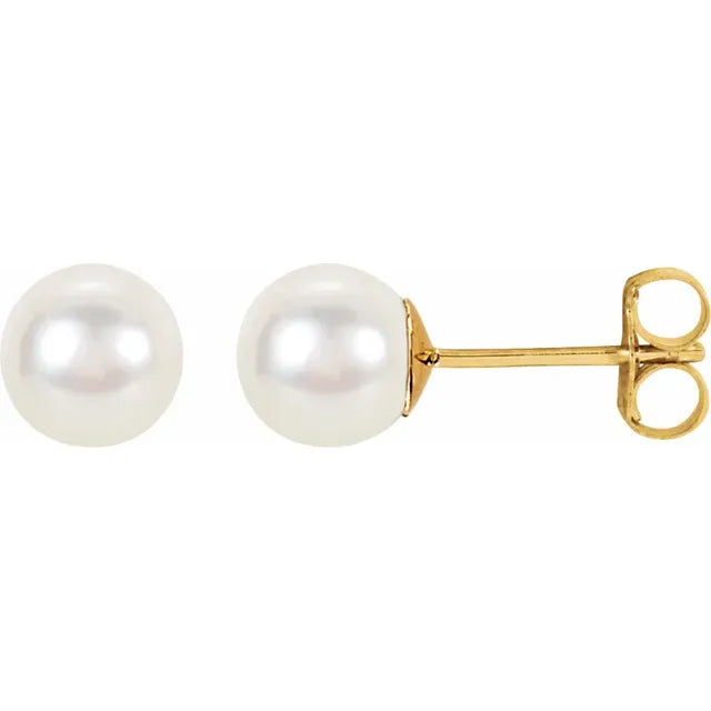 Round 8 mm Pearl studs set in 14kt gold. Ear backs not included
