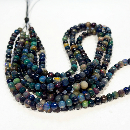 Black Ethiopian Opal Beads 15" strands, roundish, approx 5mm $99 Treated