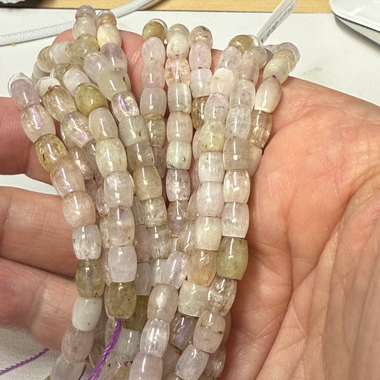 Kunzite with "Cats Eye" effect. approx 5x7mm 16" strands