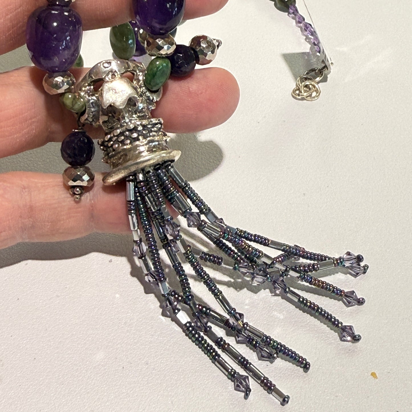 Quetzalcoatl "Feathered Serpent" Emerald, Amethyst, Hematite and sterling silver Approx 18"