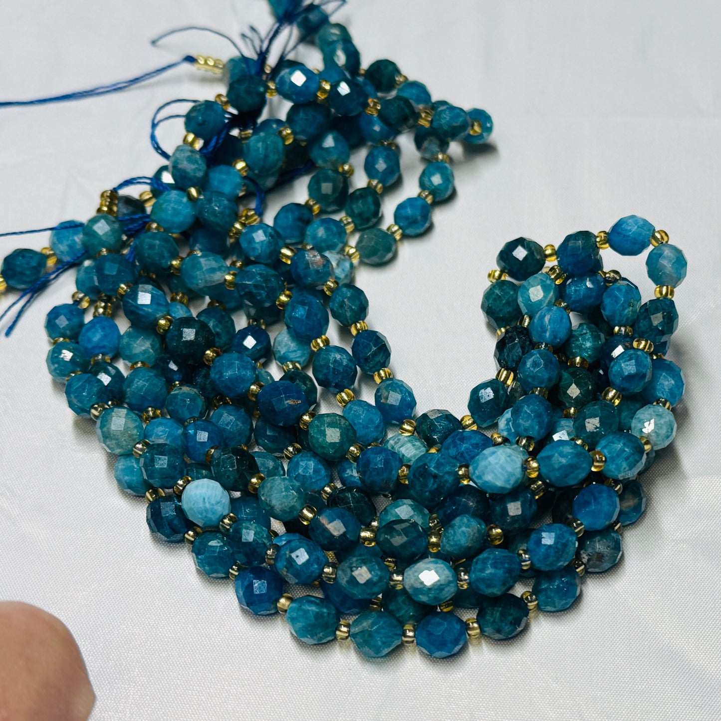 Apatite 6x8 faceted olive shape, 16" strands