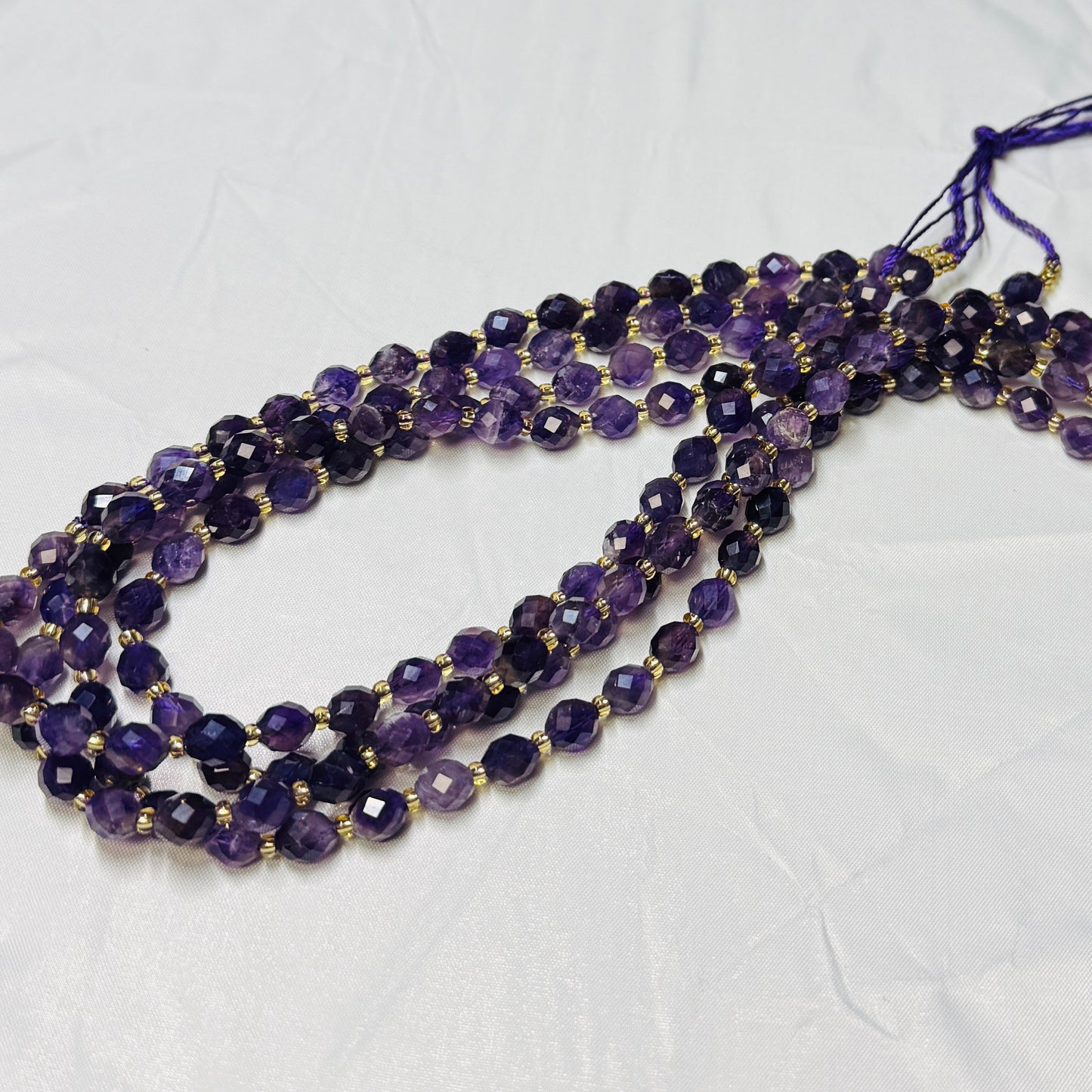 Amethyst 6x8 faceted olive shape, 16" strands