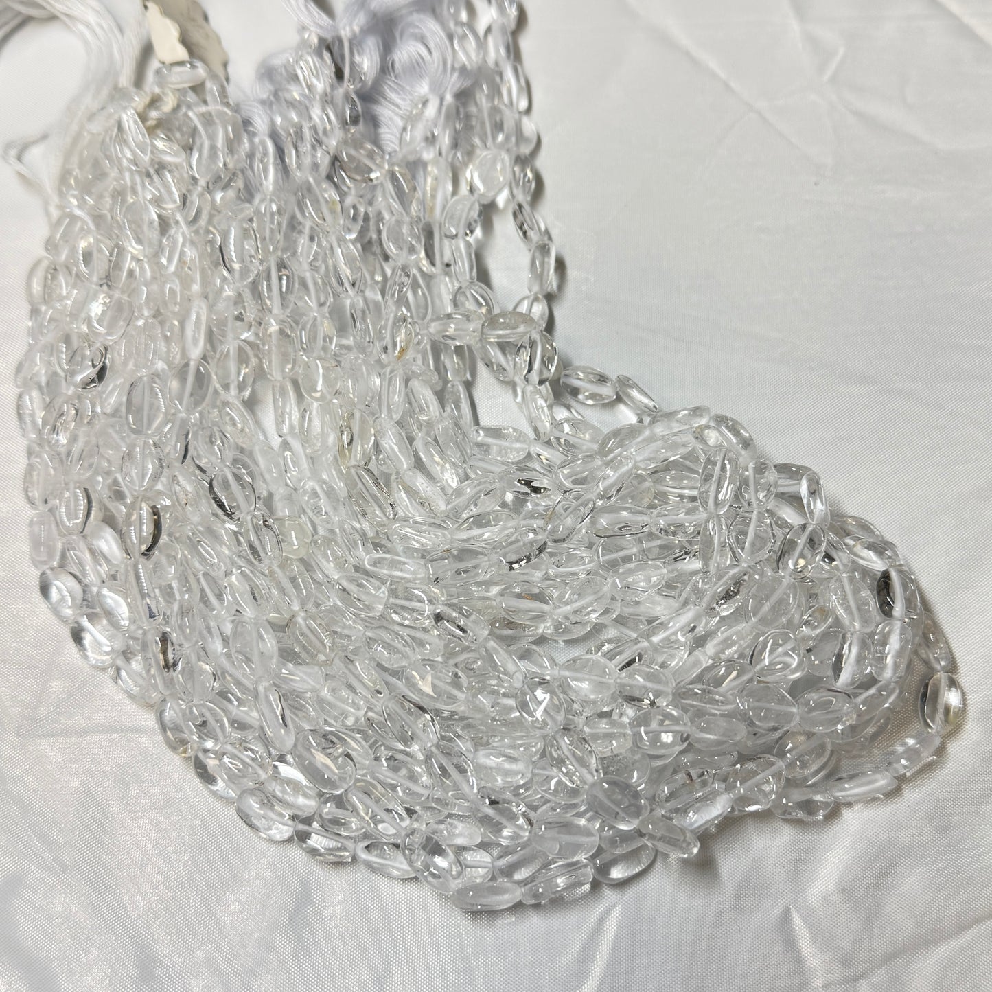 Natural "Ice" Clear Quartz 6x9 flat oval beads 16" strands