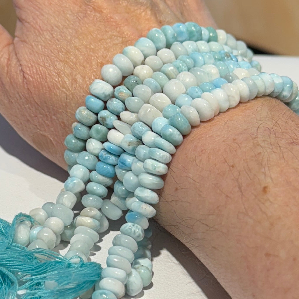 Larimar Roundels Hand cut and polished. approx 7 mm 15" strands