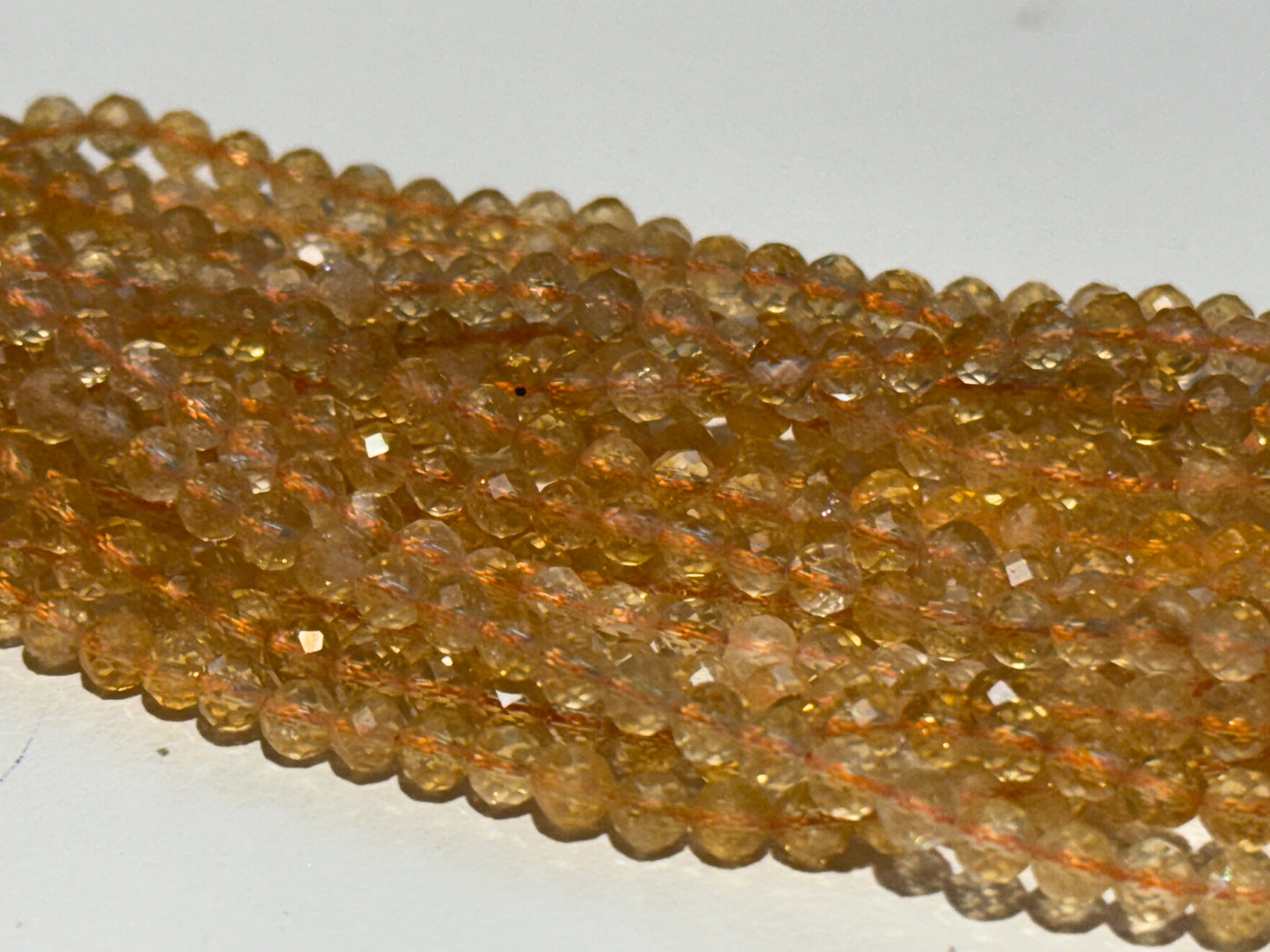 Citrine faceted round beads 4 mm approx 15" strands. These are natural