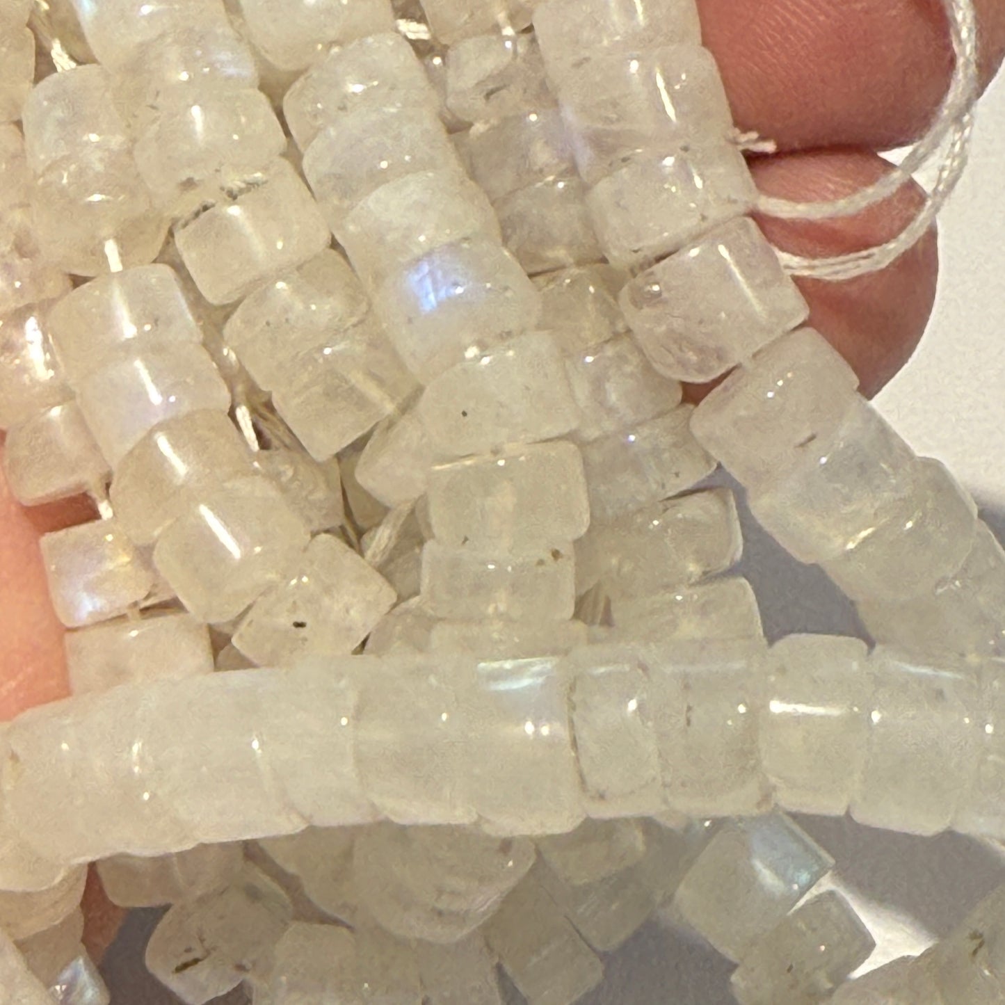 White Moonstone with blue flashes, approx 8 mm, 15" strands, tire shaped