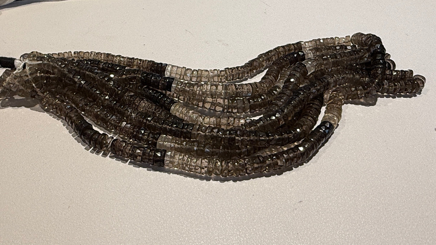 Smokey Quartz "Tire Shaped" beads, faceted. Approx 7 mm 15" strands
