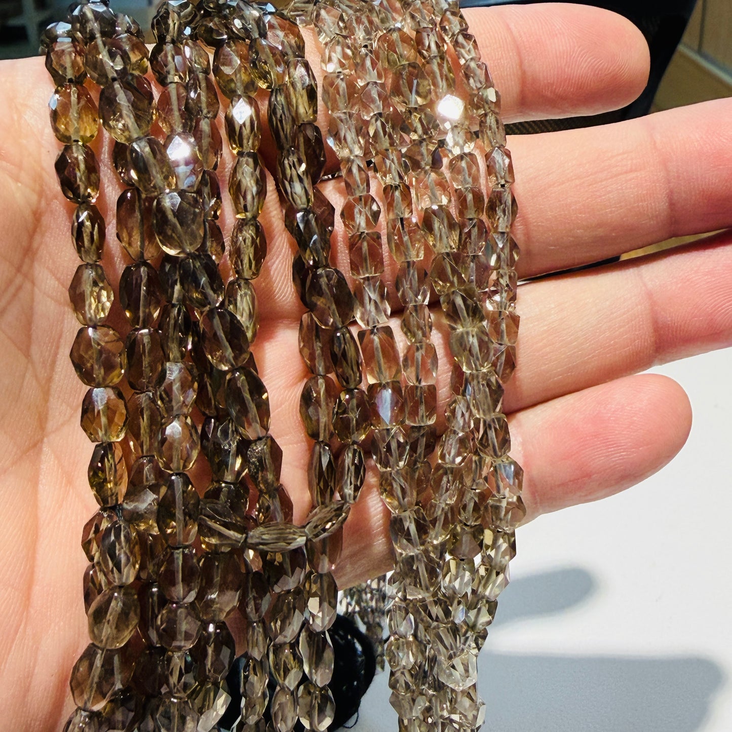 Smokey Quartz beads, faceted, nice quality, approx 15" strands, $10 a strand!