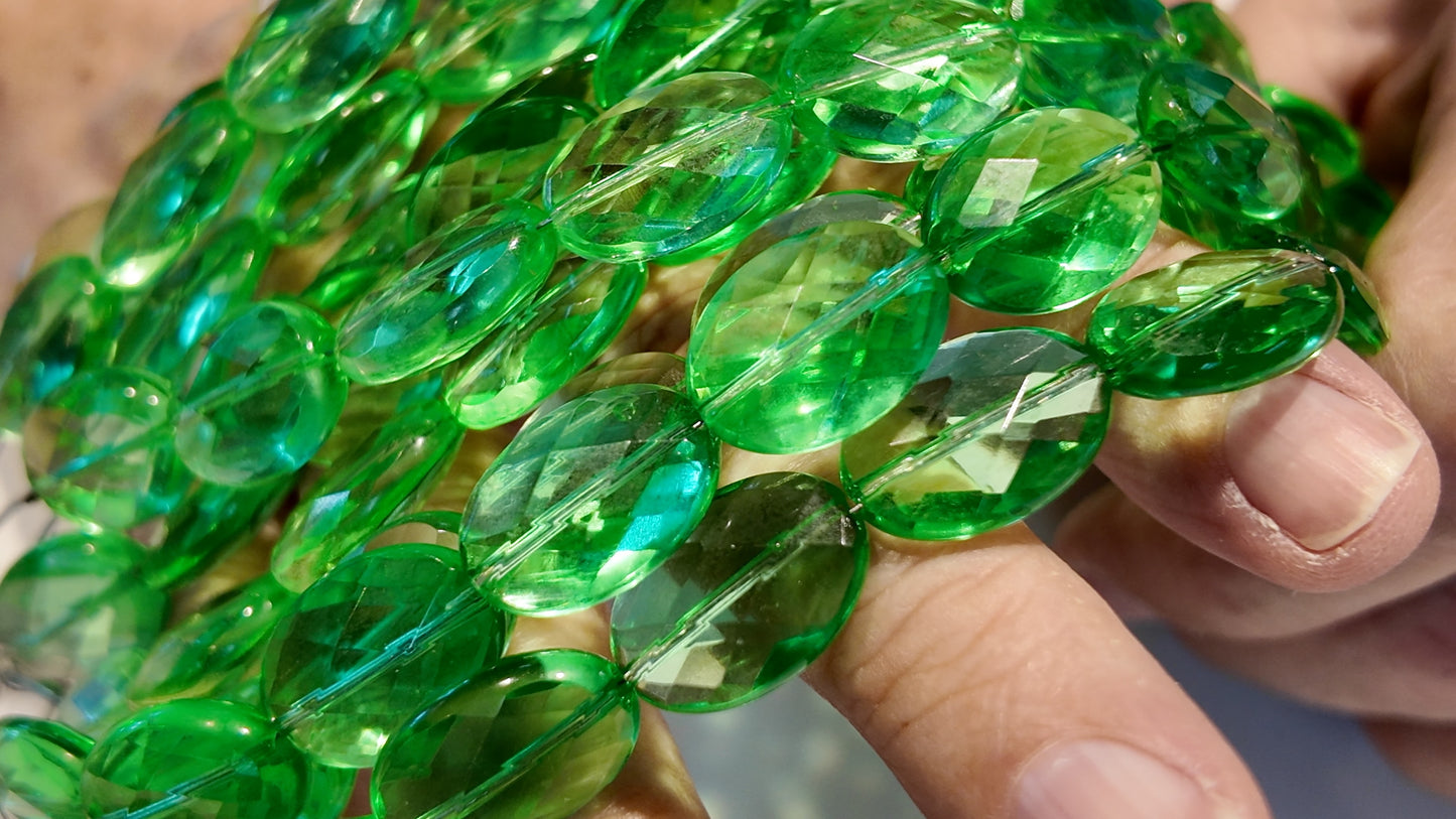 Green Quartz faceted flat oval beads.  Approx 14x16  8" strand, probably treated
