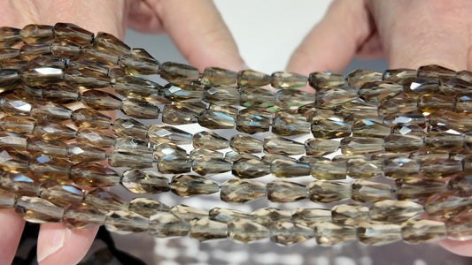 Smokey Quartz Vase shape, faceted, beads.  6x9mm approx 16" strands!