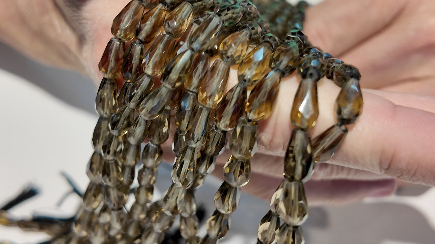Smokey Quartz Vase shape, faceted, beads.  6x9mm approx 16" strands!