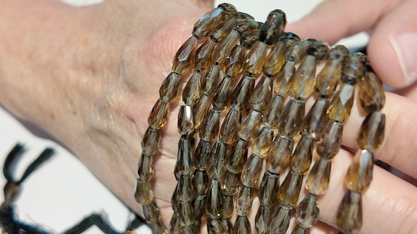 Smokey Quartz Vase shape, faceted, beads.  6x9mm approx 16" strands!