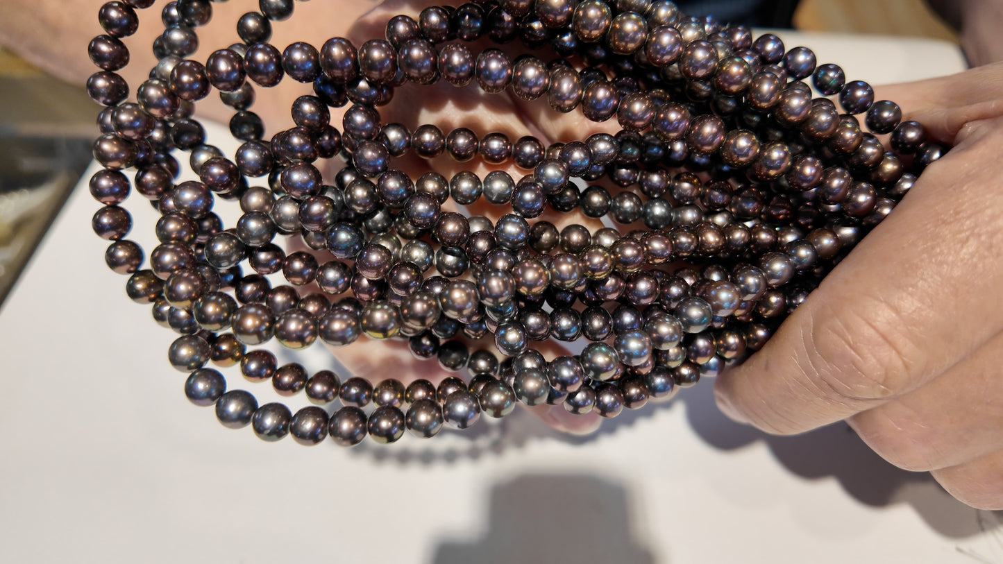 Peacock Pearls roundish about 6 mm 15" strands.   $10 a strand!