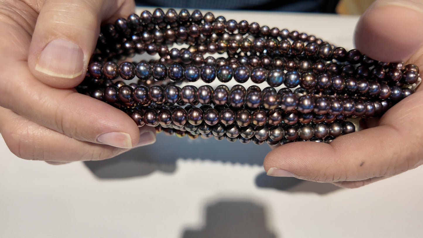 Peacock Pearls roundish about 6 mm 15" strands.   $10 a strand!