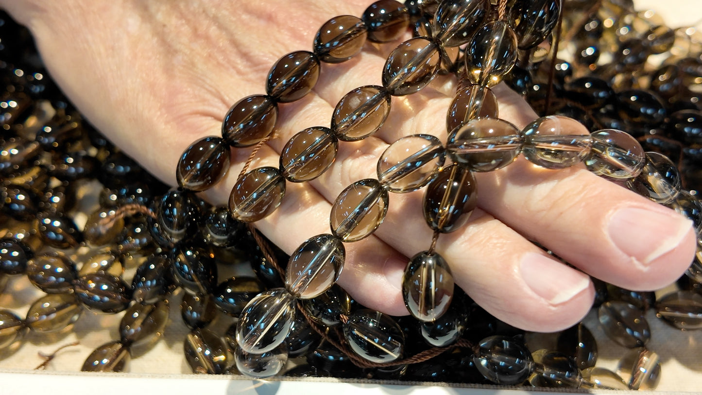 Smokey Quartz Olive shape, all natural.  Smooth polish, approx 10x14 15" strands!