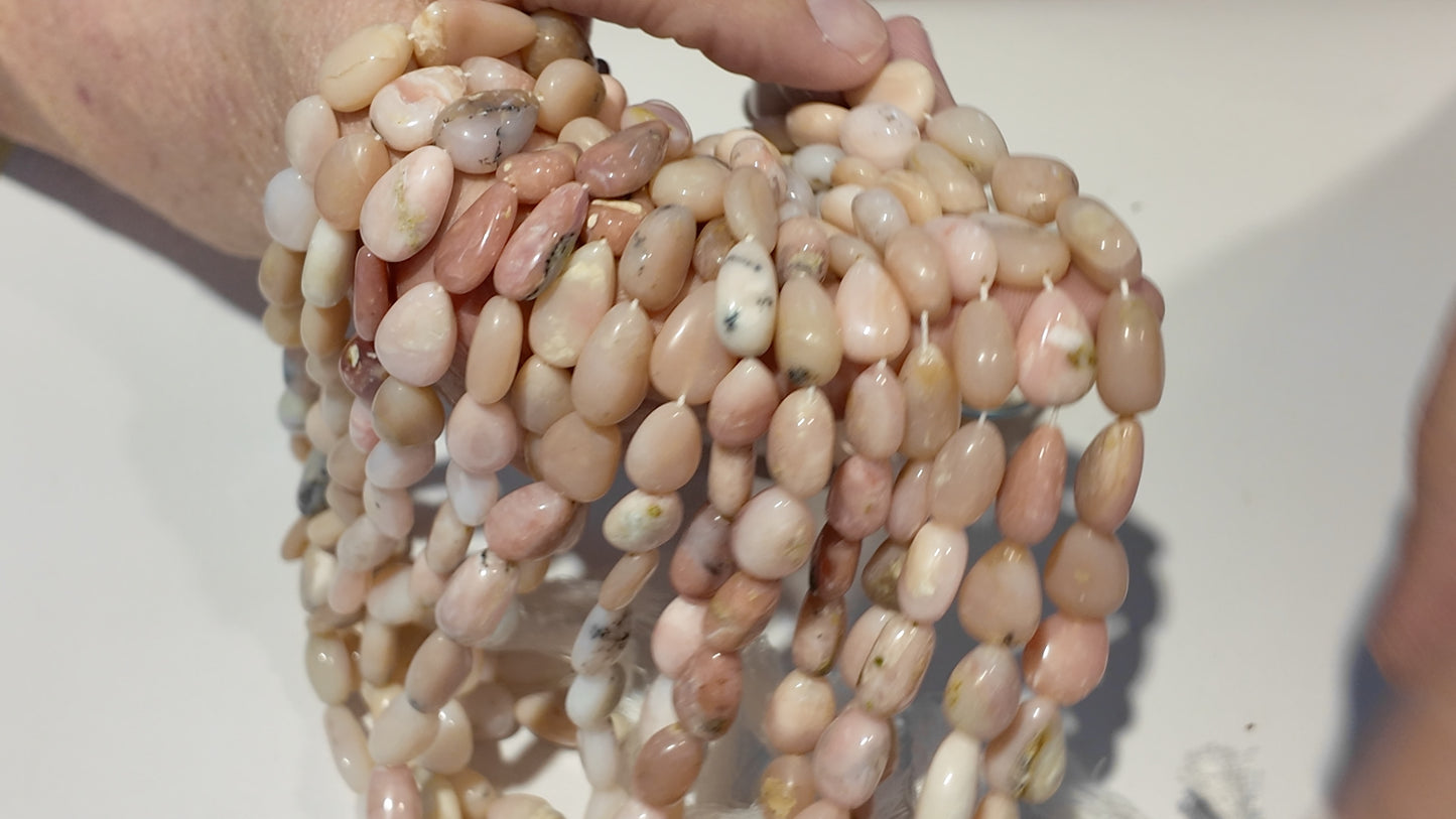 Peruvian Opal Pear Shape 15" strands.  Only $10 a strand!