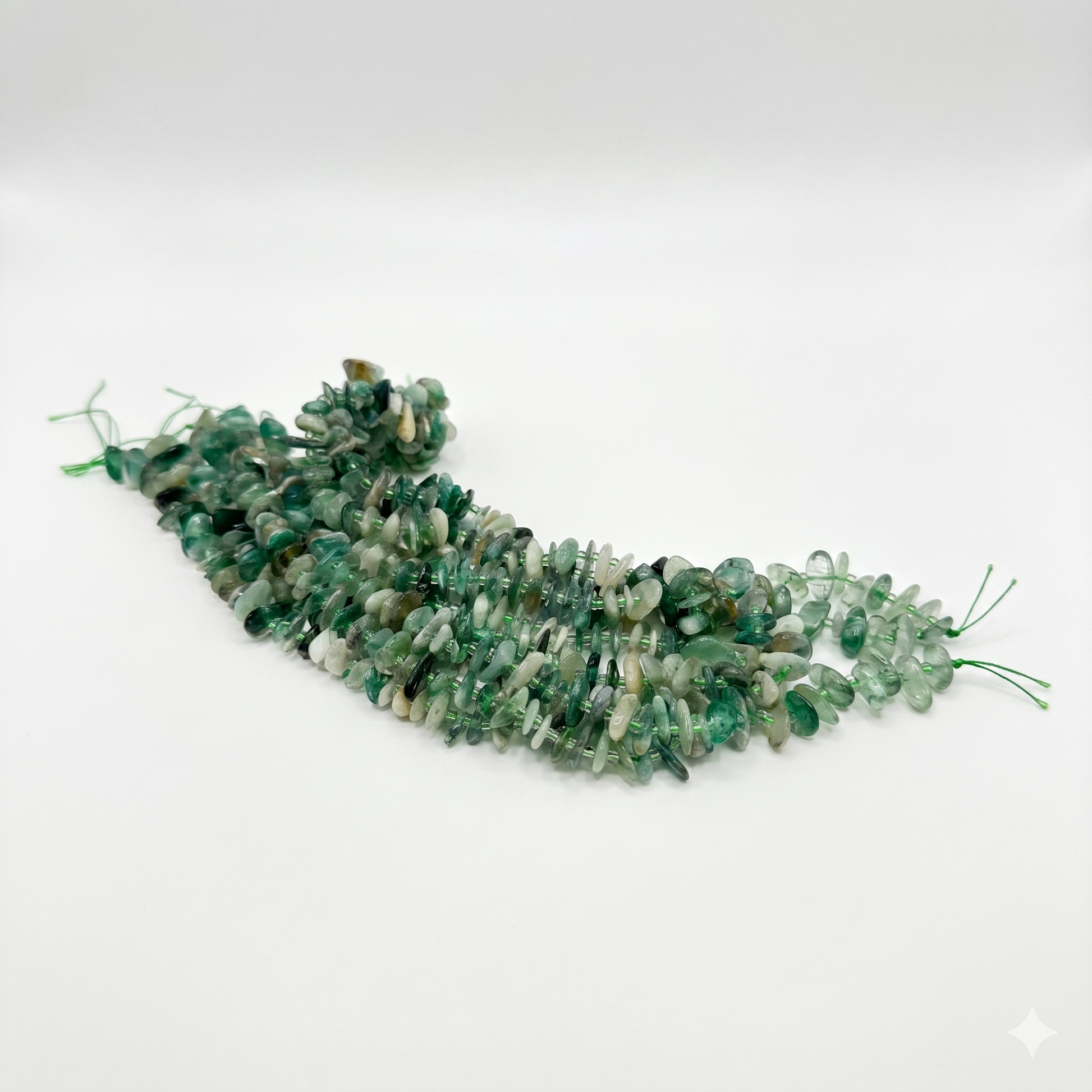 Green stone necklace on a white background