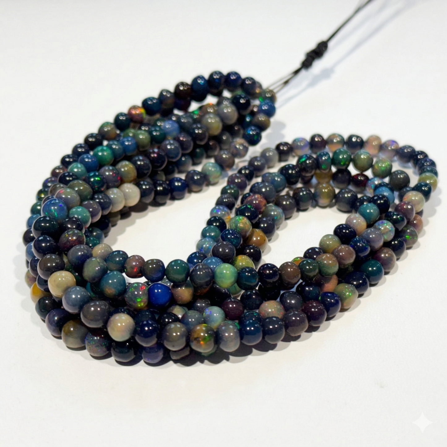 Black Ethiopian Opal Beads 15" strands, roundish, approx 5mm $99 Treated