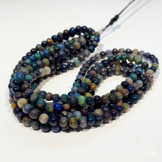 Black Ethiopian Opal Beads 15" strands, roundish, approx 5mm $99 Treated