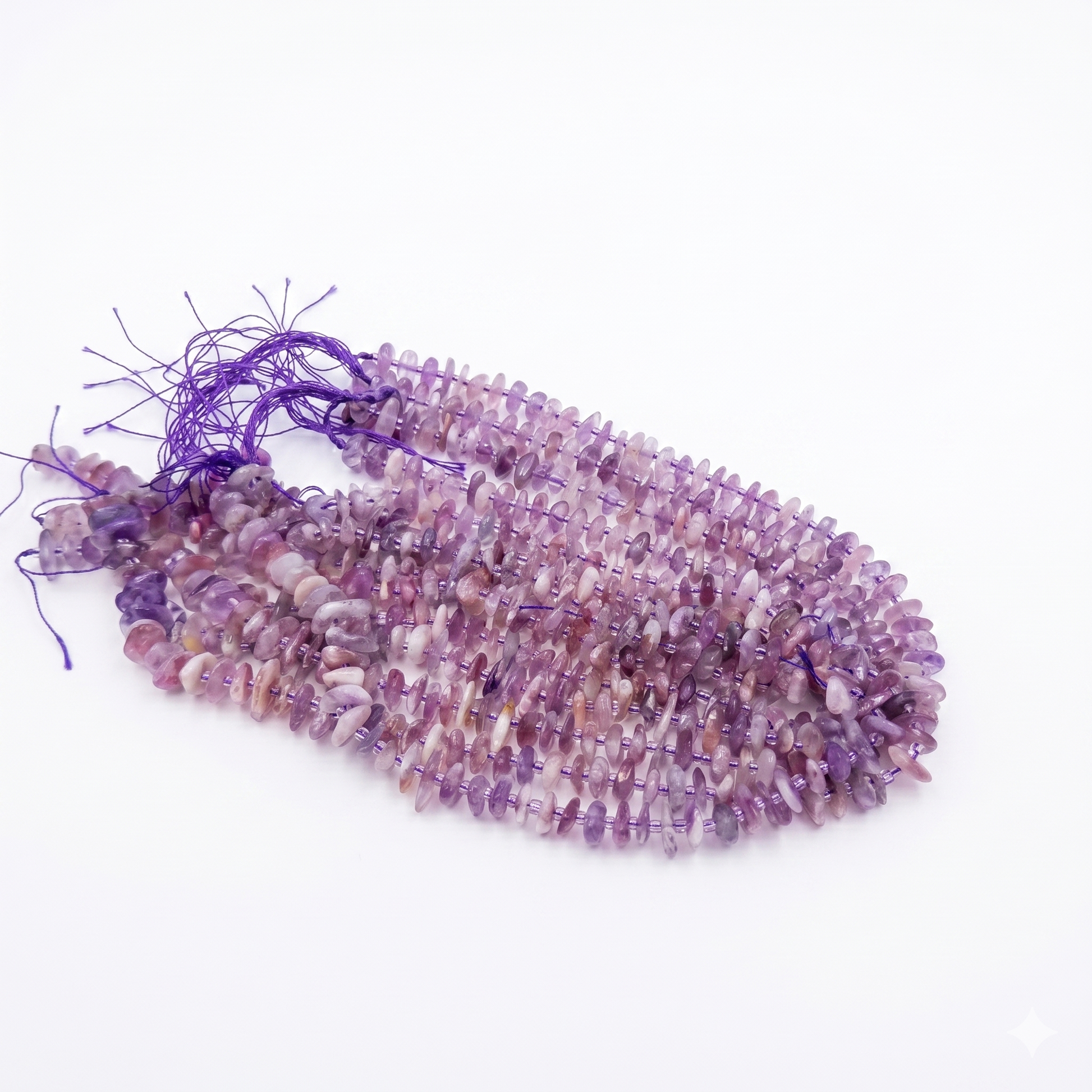 String of purple beads on a white background