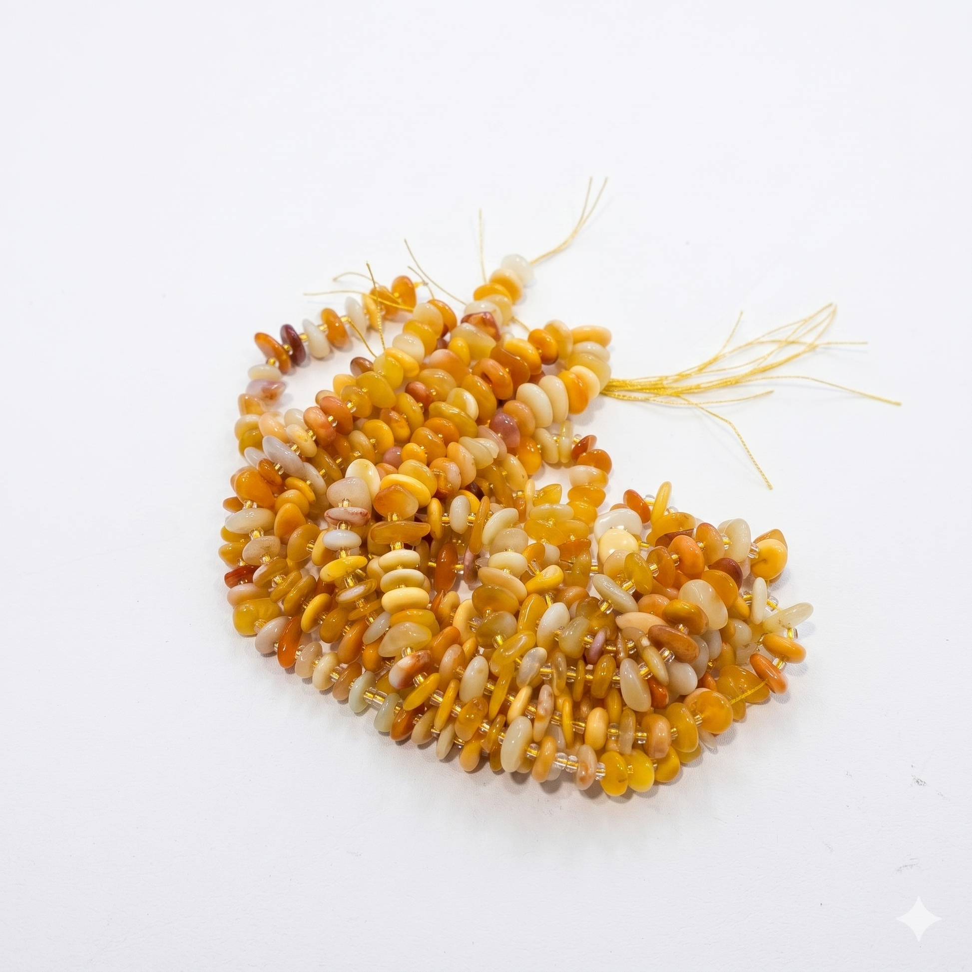 Cluster of citrine beads on a white background