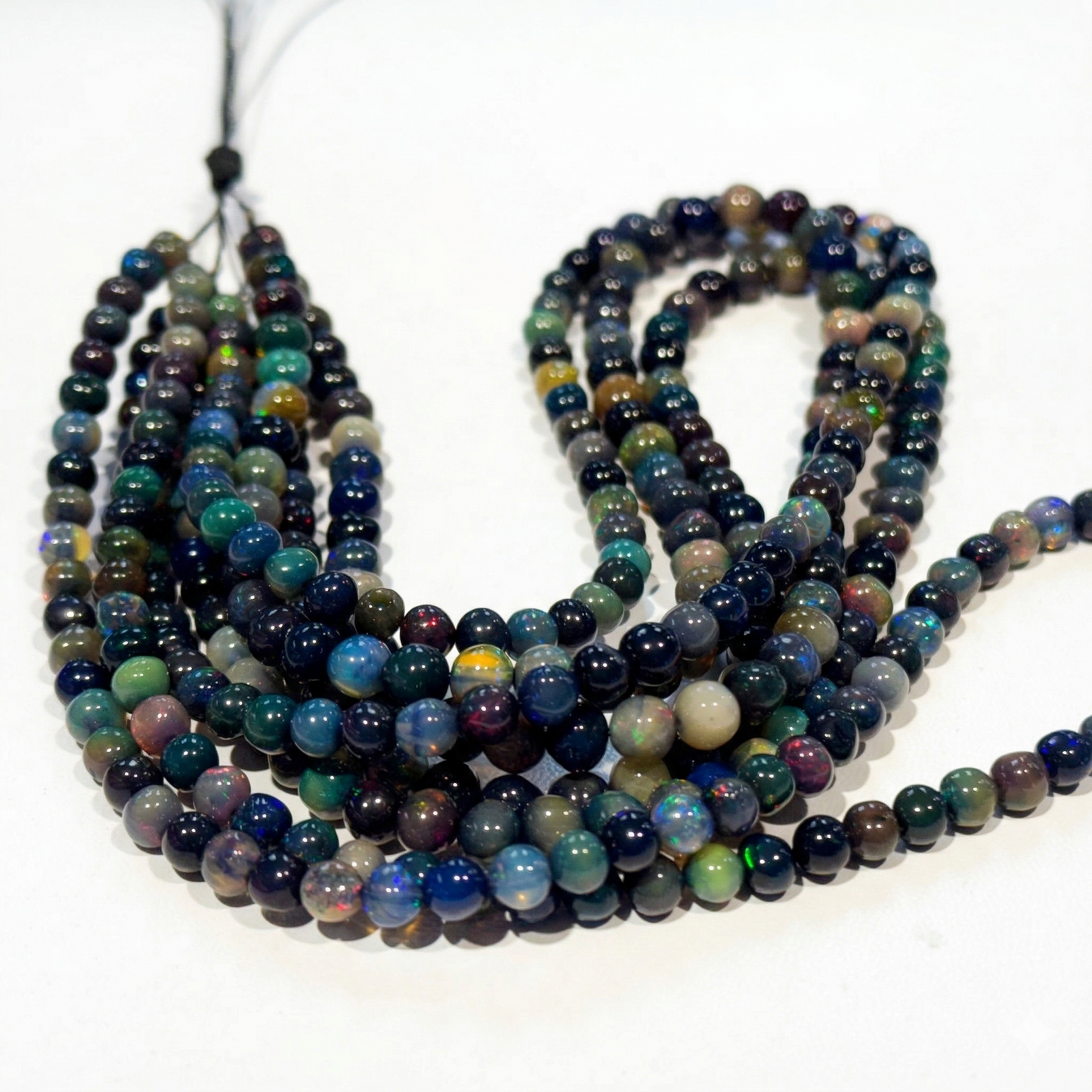 Black Ethiopian Opal Beads 15" strands, roundish, approx 5mm $99 Treated