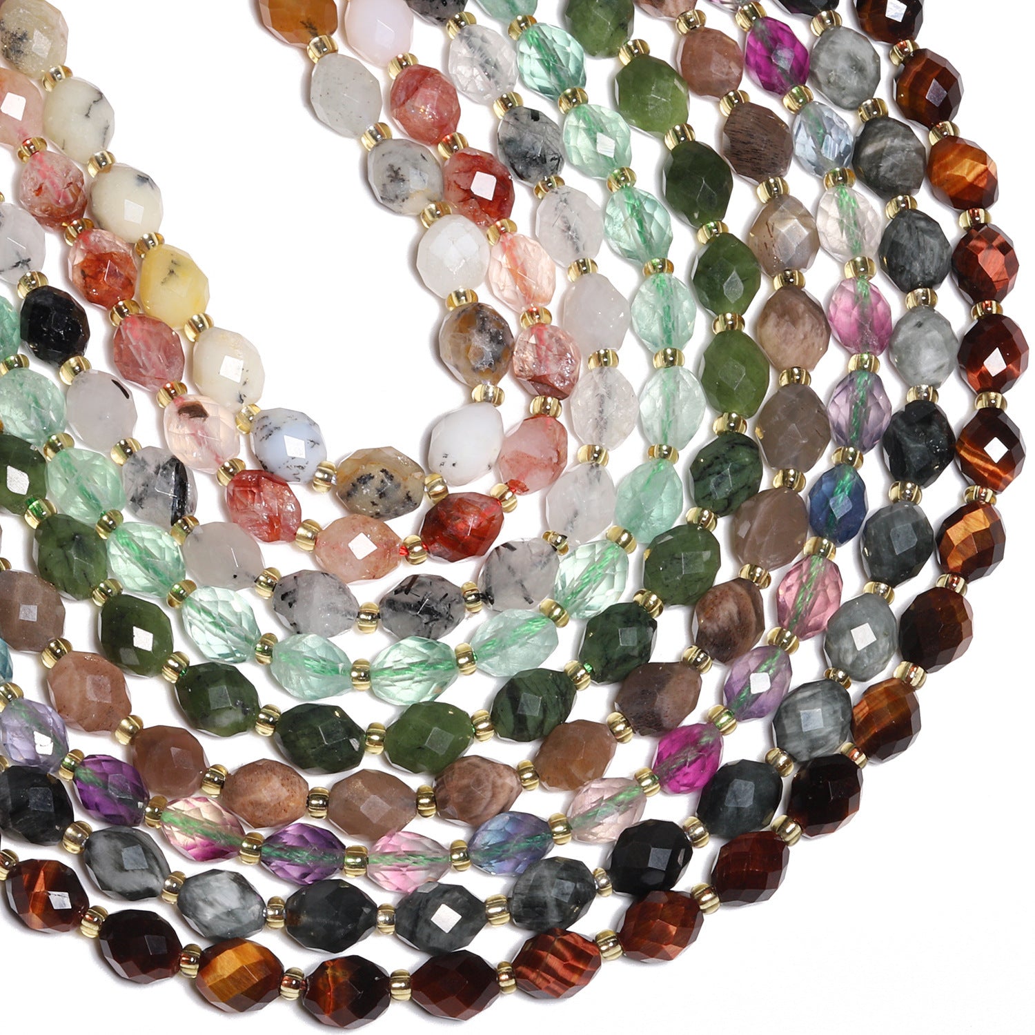 Multiple strands of faceted gemstone beads in assorted colors and patterns, separated by small gold spacer beads, arranged on a white background.