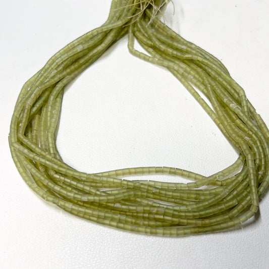 Jade heishi cut beads.  2.5mm 16" strands, no treatments