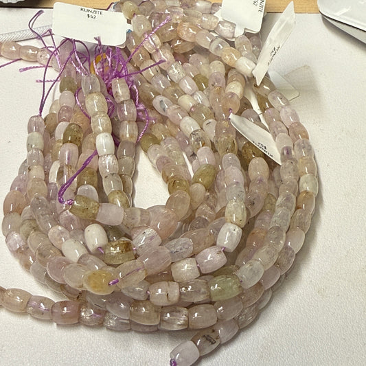 Kunzite with "Cats Eye" effect.  approx 5x7mm 16" strands