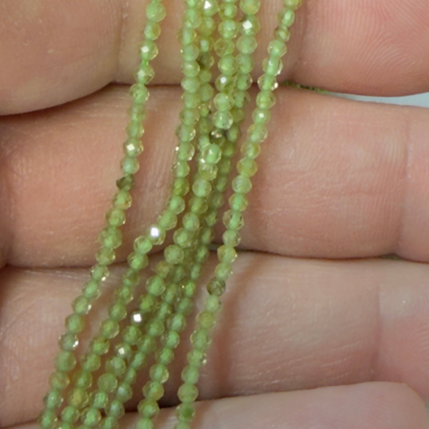 Peridot Faceted Rounds 2 mm 16" Natural