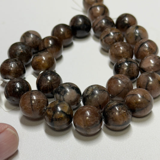 Chiasolite 14 mm, natural you get 14 beads 8"