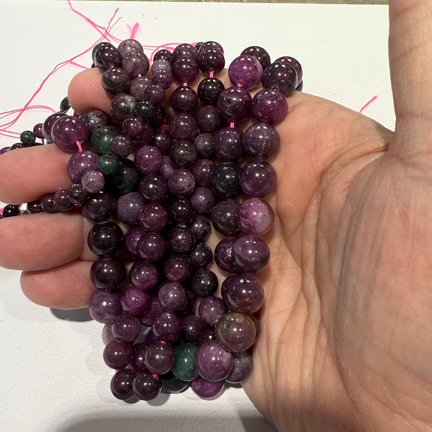 Ruby with some Zoisite.  All natural.  16" strands