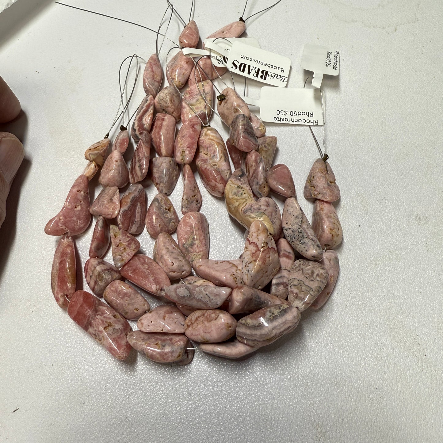 Rhodochrosite Polished Freeform beads from Argentina!  8" strands