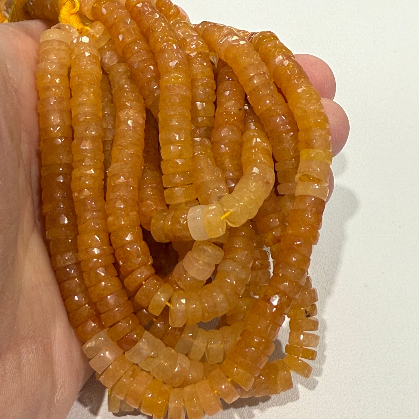 Carnelian Faceted "Tire" shaped beads 8 mm 16" strands