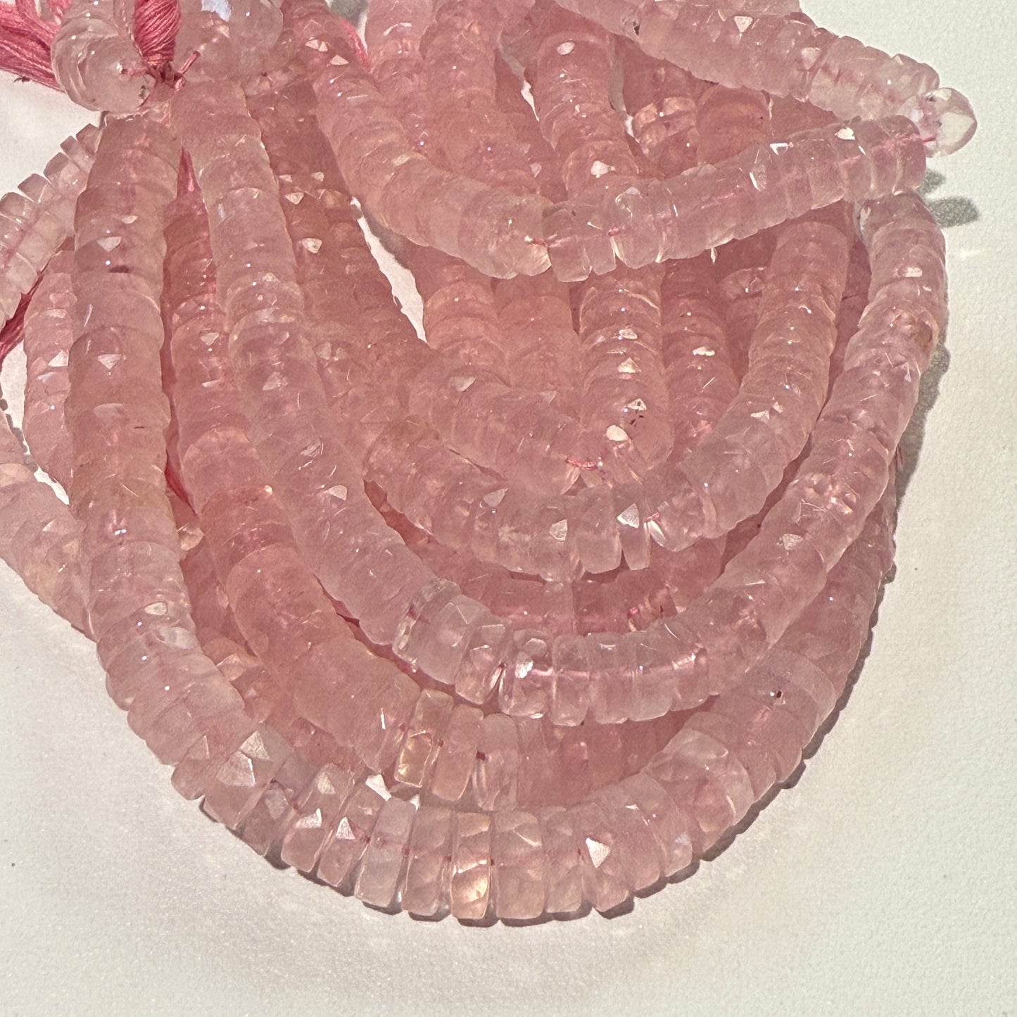 Rose Quartz Faceted "Tire" shaped beads approx. 8 mm 16" strands