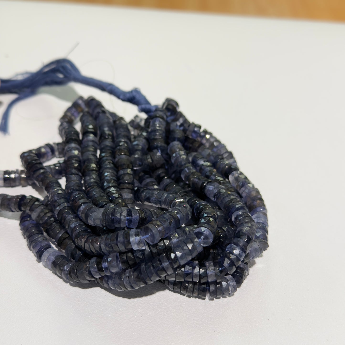 Iolite Faceted "Tire" Shaped beads approx. 8 mm 16" strands