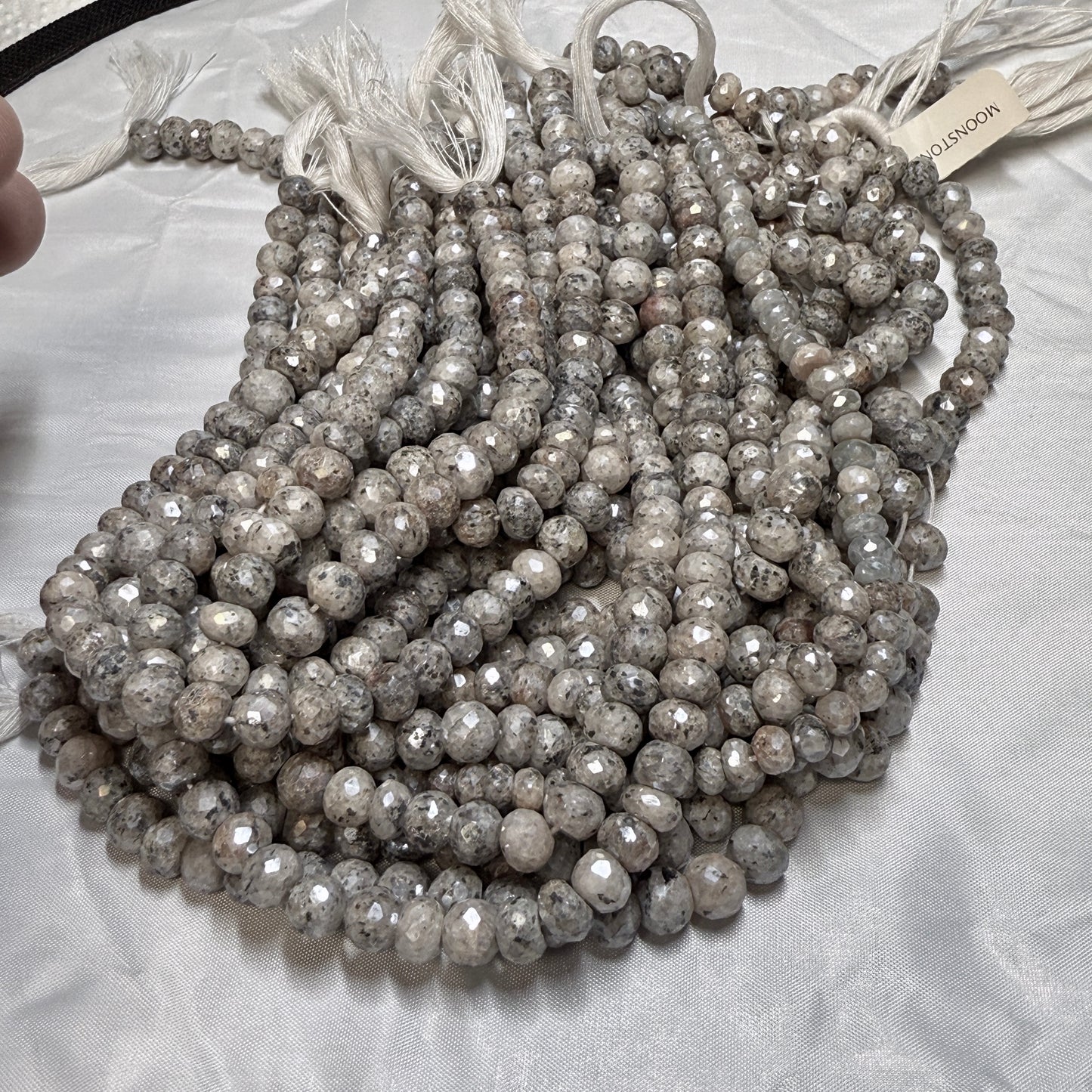 Gray Moonstone faceted with sparkle finish. approx. 8 mm 16" strands