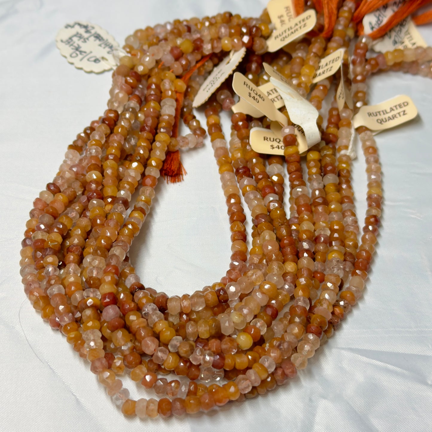 Rutilated Quartz Faceted Roundels 5-6 mm  16" strands