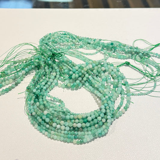 Genuine Emerald Beads faceted rounds, no treatments.  15" strands