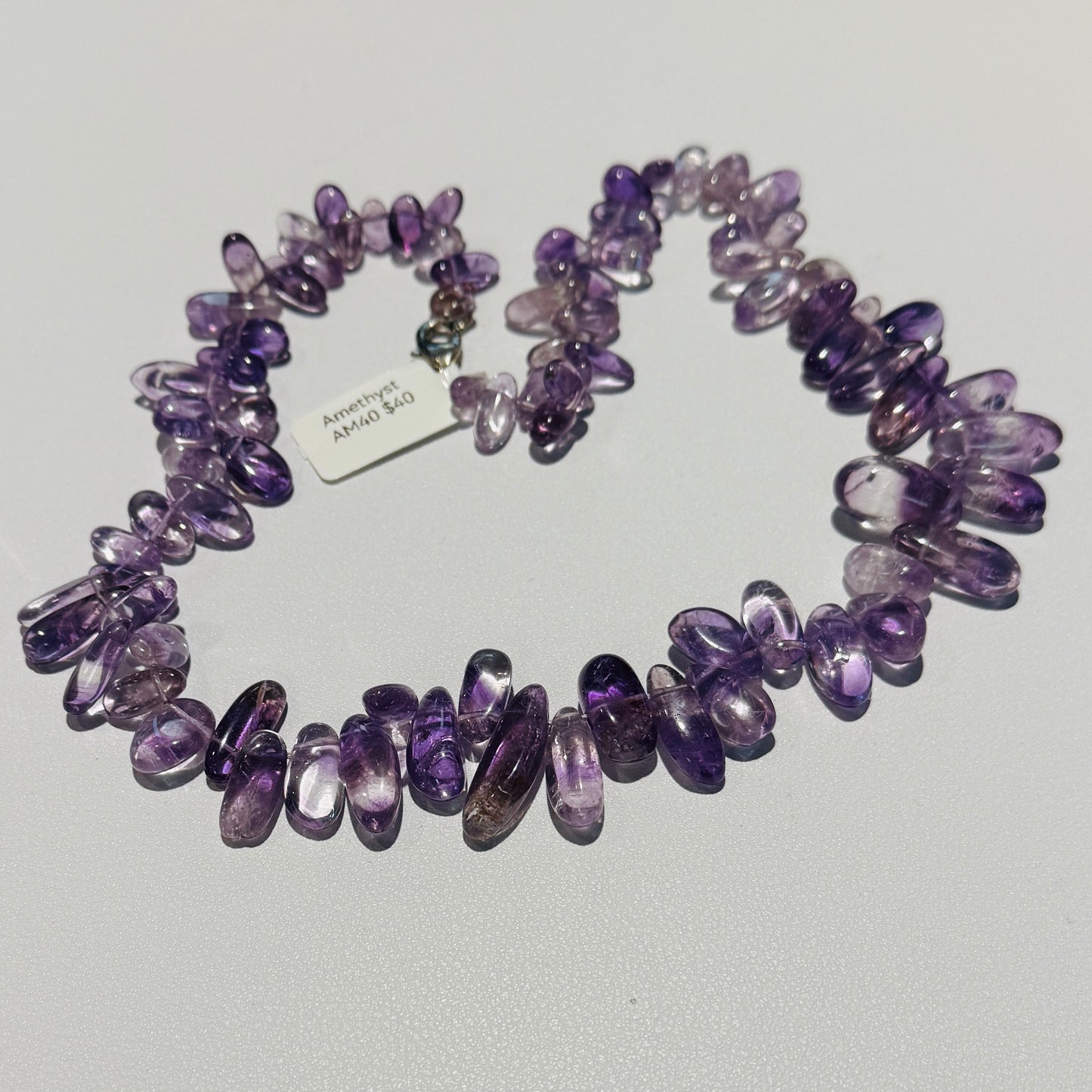 Amethyst polished top drilled beads with clasp 18"