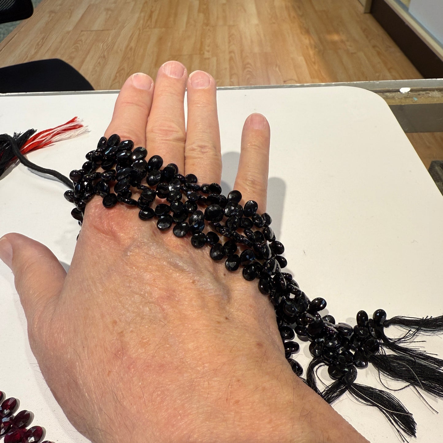 Black Spinel Briolettes Faceted, about 10" strands