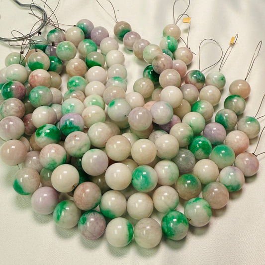 Jade, dyed, Cool green/white/lavender colors.  12mm 8" strand