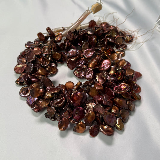 Chocolate Color Keishi Pearls.  Nice quality! Approx 15" strands