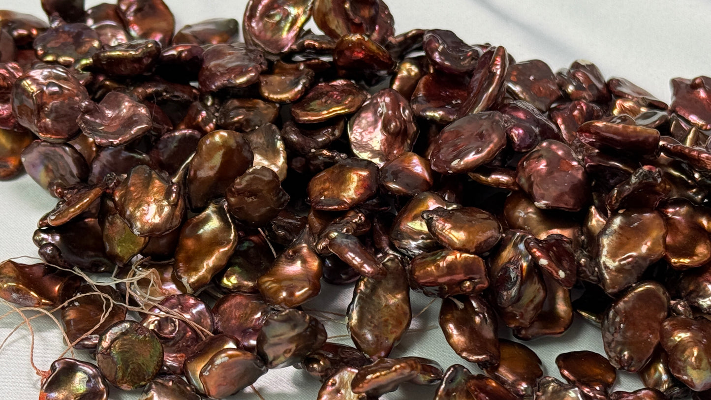 Chocolate Color Keishi Pearls.  Nice quality! Approx 15" strands