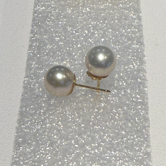 Round 8 mm Pearl studs set in 14kt gold.  Ear backs not included