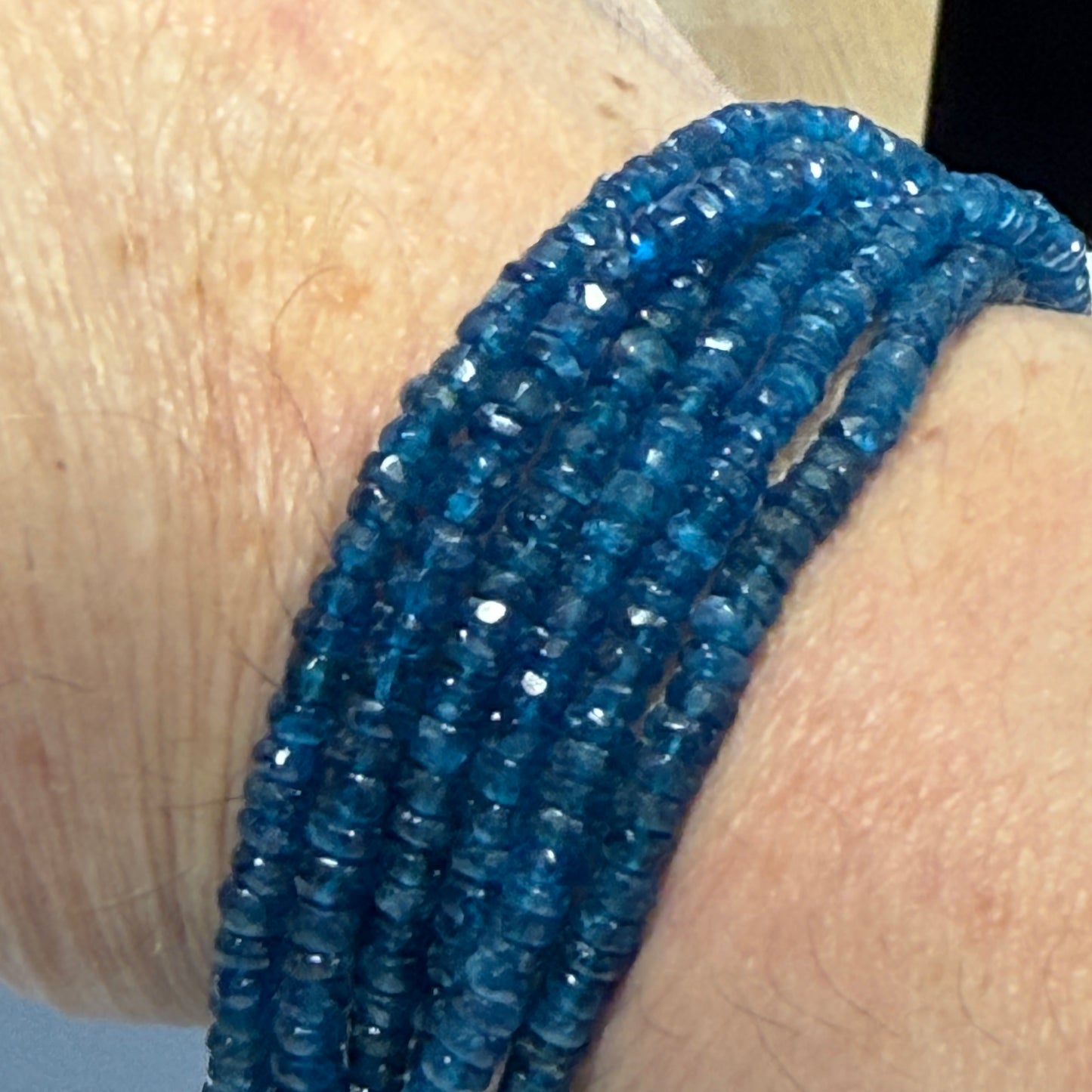 "Neon" Apatite mid blue color.  4 mm faceted roundels approx 15" strands