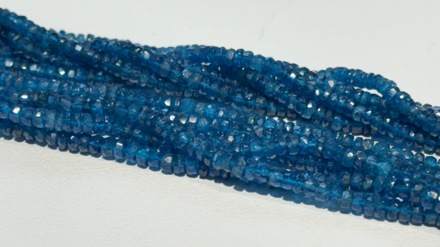 "Neon" Apatite mid blue color.  4 mm faceted roundels approx 15" strands