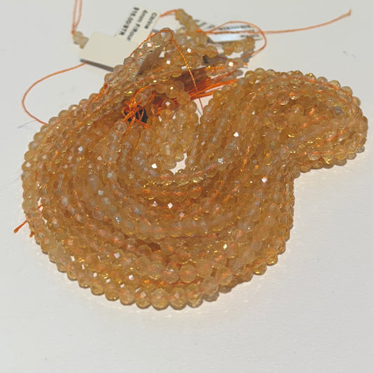 Citrine faceted round beads 4 mm approx 15" strands.  These are natural