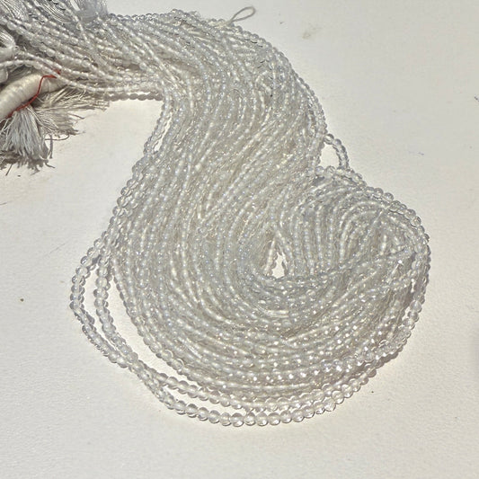 Clear, natural quartz round beads.  2.5mm 15" strands!